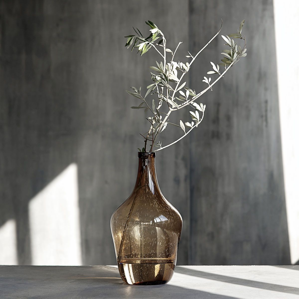 Tall Brown Recycled Glass Bottle Vase in room