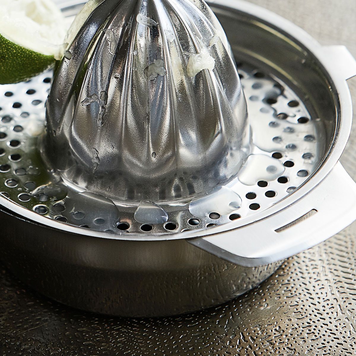 Stainless Steel Citrus Press Lifestyle Closeup