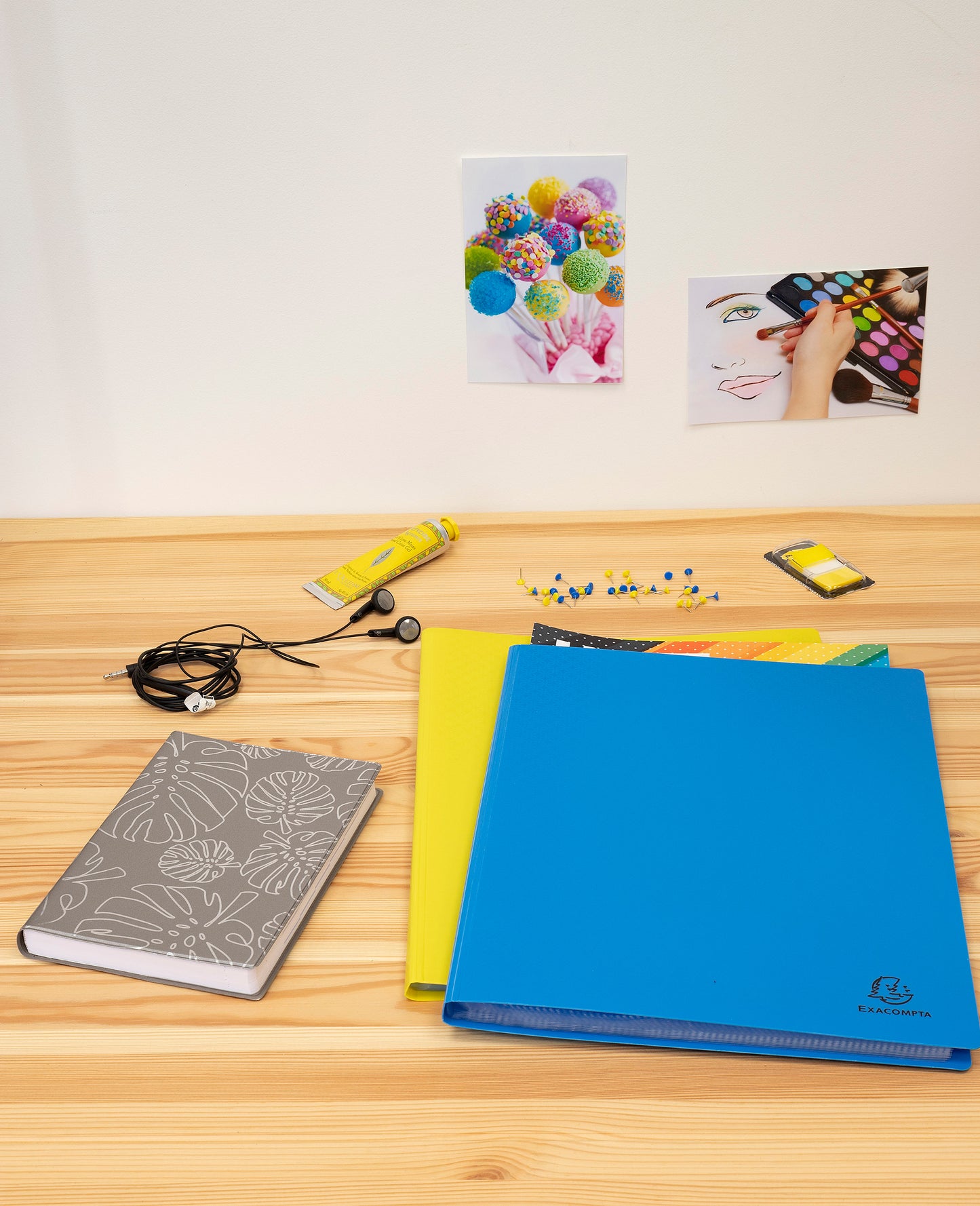 Recycled Plastic A4 Display Book 20 Pockets Fuchsia on desk