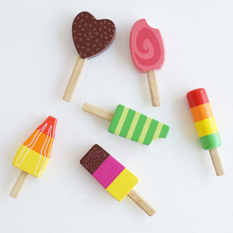 Wooden Toy Ice Lollies scattered